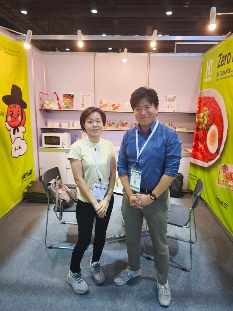 Chin Woh team with international trade partner at Mega Halal Bangkok exhibition