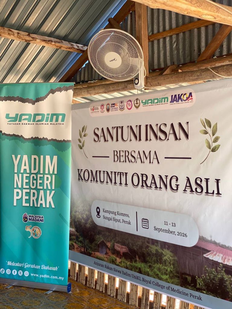 Santuni Orang Asli community programme banner for an outreach activity in Kampung Kormes, Sungai Siput.